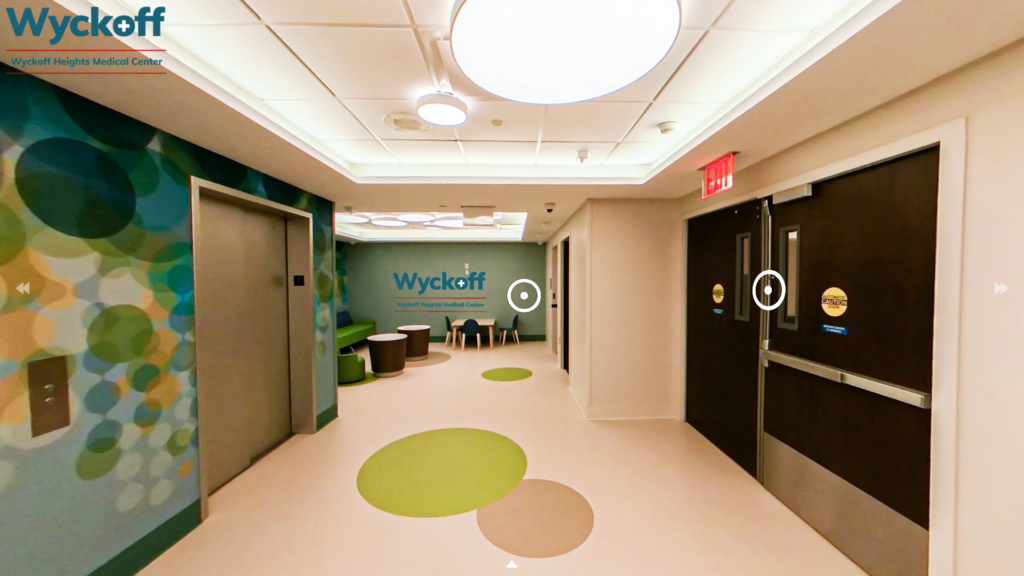 A bright and welcoming entrance and central nursing station at the newly renovated Wyckoff Heights Pediatric Emergency Department, featuring modern lighting and clean, kid-friendly design.
